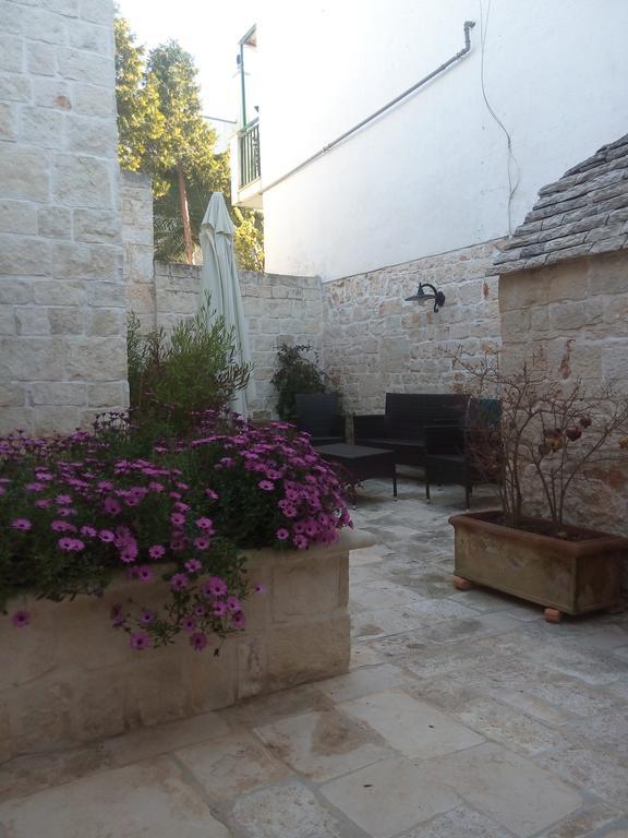 Alberobello Casa Vacanze - Pathos Tra I Trulli Villa Bagian luar foto