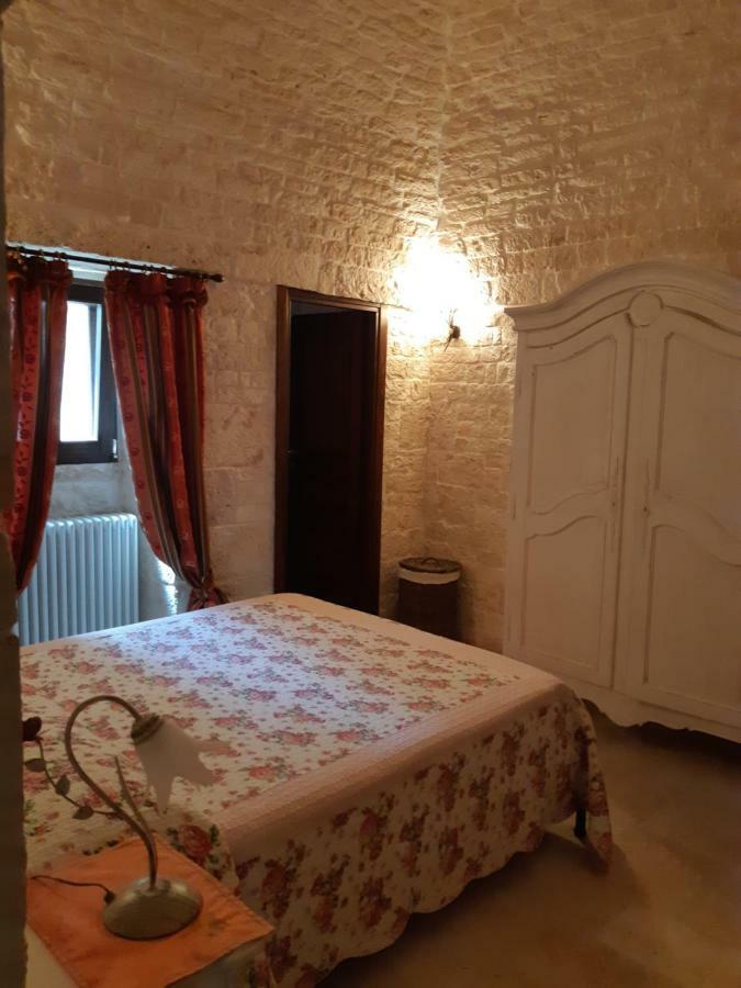Alberobello Casa Vacanze - Pathos Tra I Trulli Villa Bagian luar foto